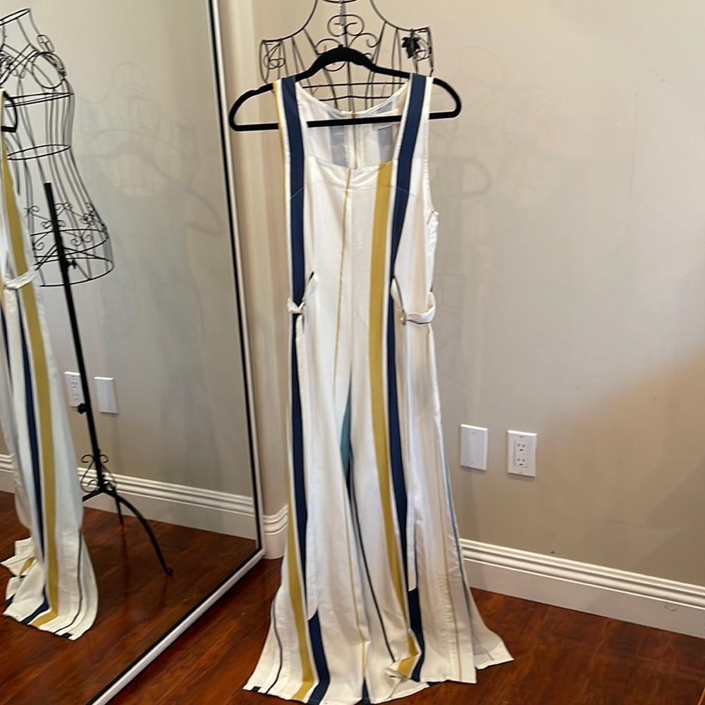 Sancia jumper. Pockets, slit pant leg and zipper back